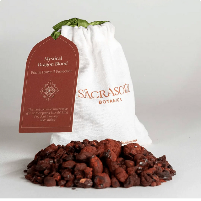 Socotran Dragon's Blood red resin beside a Sacrasoul pouch with a red tag