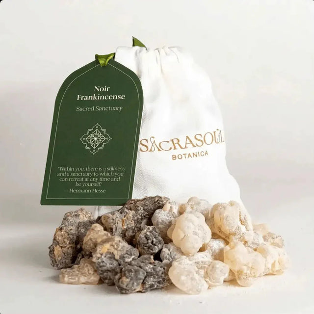 Hojari Blend frankincense resin spilling from a Sacrasoul pouch with a green tag